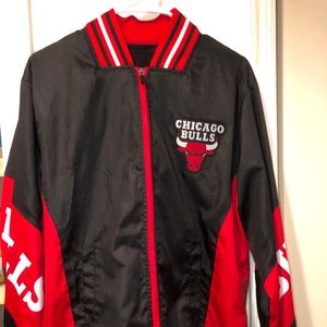 Black Chicago bulls zip up jacket.